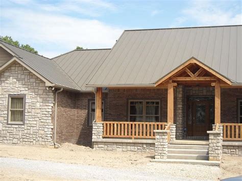 houses with stone and metal roofs|brick house metal roof pictures.